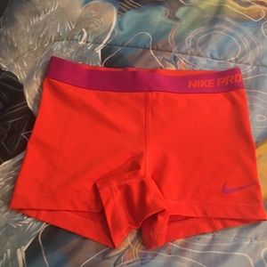 Orange & purple Nike pro shorts